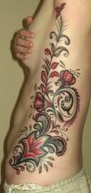 floral girl tattoo
