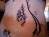 stomach tattoo for women