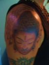 buddha face tat picture