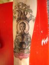 buddha image tattoo