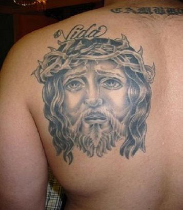 Jesus Tattoo On Left Shoulder Blade