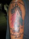 jesus pic tattoos on arm