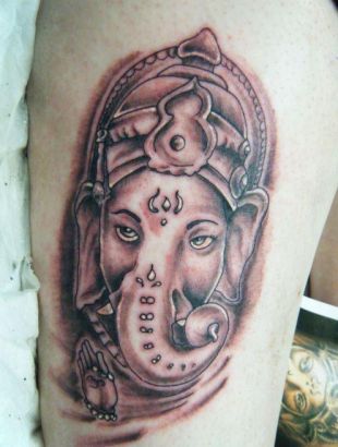 Ganesh Face Tattoo 