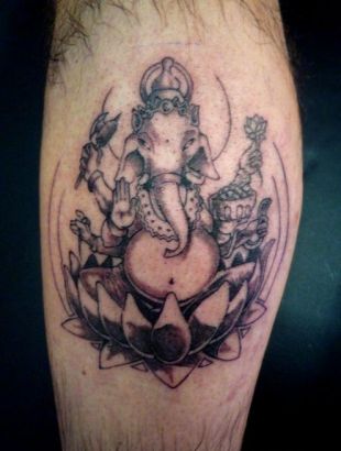Ganesh With Lotus Tattoo On Leg
