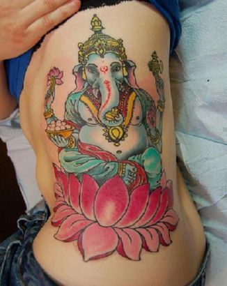 Ganesha Pic Tattoo On Rib