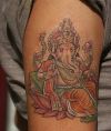 ganesha tattoo on right arm