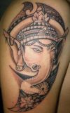 ganesha tattoo on thigh