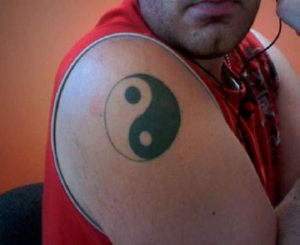 Yin Yang Tattoo On Arm