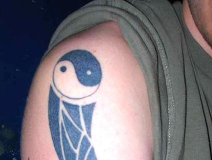 Yin Yang Tattoo On Right Shoulder