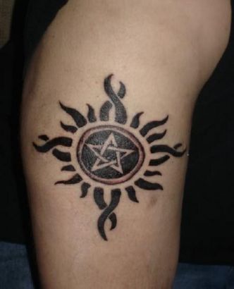 Pentagram And Sun Tattoo On Arm