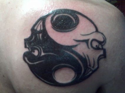 Yin Yang Tattoo On Shoulder Blade