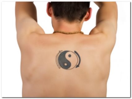 Yin Yang And Arrow Symbol Tattoo