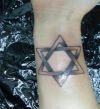 hexagram tattoo on wrist