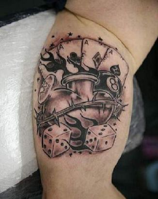 Gambling Biceps Tattoo