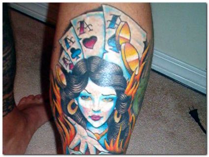 Girl With Gambling Tattoo On Calf