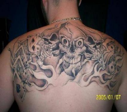 Gambling Tattoo On Man's Back