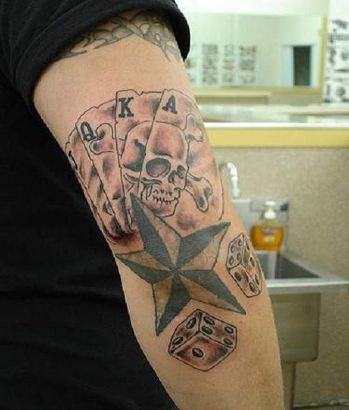 Gambling Tattoo On Elbow