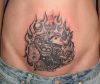 gambling tattoo on lower stomach