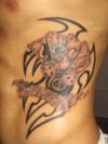 gambling side rib tattoo