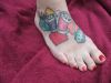 geek tattoo on feet