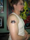 geek tattoo on shoulder