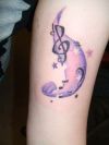 music tattoo on arm