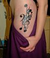 music tat on hip