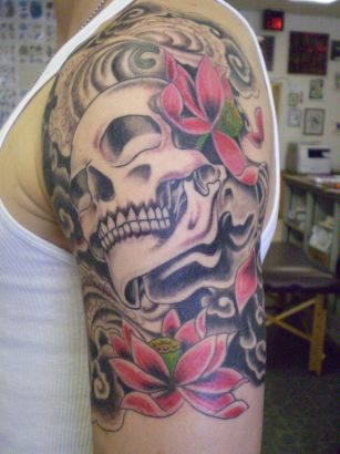 Man With Skull Tat