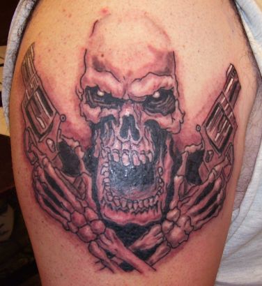 Skull With Gun Tat