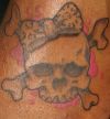 girl skull tat