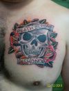 tat of skull on chest