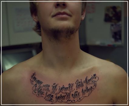 Text Tats On Man's Chest