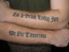 text hand tattoo