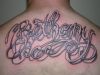 text tattoo back