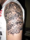 shoulder text tattoo