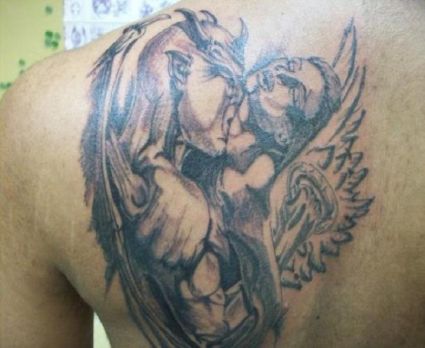 Demon And Angel Tattoo On Left Shoulder Blade