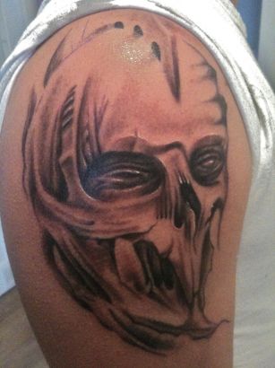 Demon Face Tattoos Image On Arm