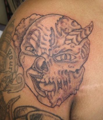 Demon Face Tattoos On Shoulder