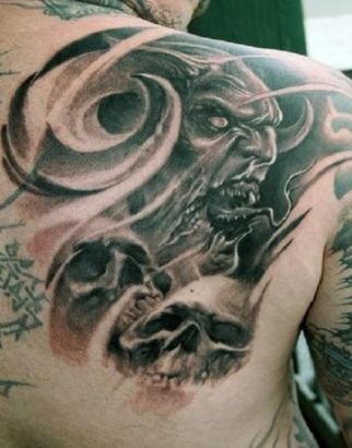 Demon Tattoo Image On Right Shoulder Blade
