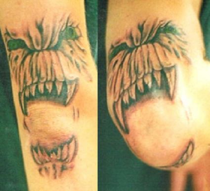 Demon Tattoo On Elbow