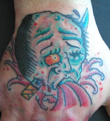 Demon Tattoo On Hand