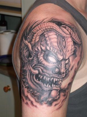 Japanese Demon Face Tattoo On Arm