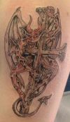 demon and cross tattoo