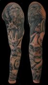 demon and skulls tattoo on full sleeve