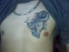 demon chest tattoo