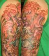 demon tattoo on half sleeve