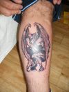 demon tattoo pic on leg