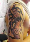 girl demon tattoo on arm