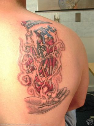 American Reaper Tattoo On Right Shoulder Blade