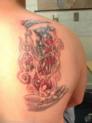 American Reaper Tattoo On Right Shoulder Blade